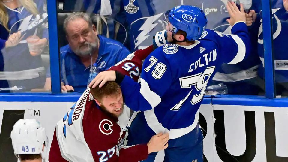 Fighting between Logan (L) of Colorado Avalanche and Ross from Tampa Bay Lightening in NHL Stanley Cup,2022
