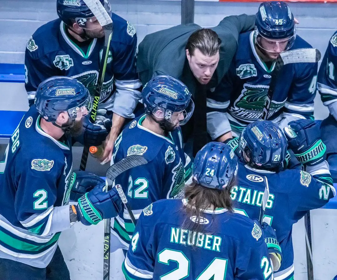 Florida Everblades team group chatting during the playoff games in May 2023