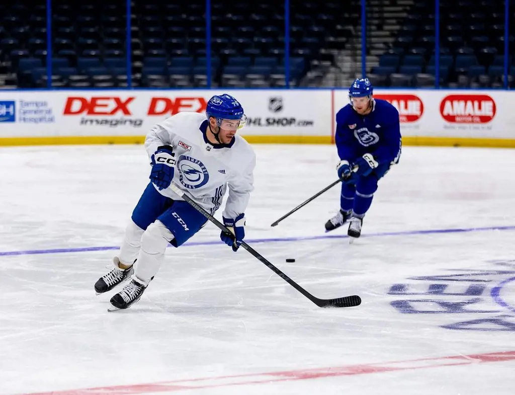 Ross Colton cornering with his hockey stick at Amelie Arena in April 2023