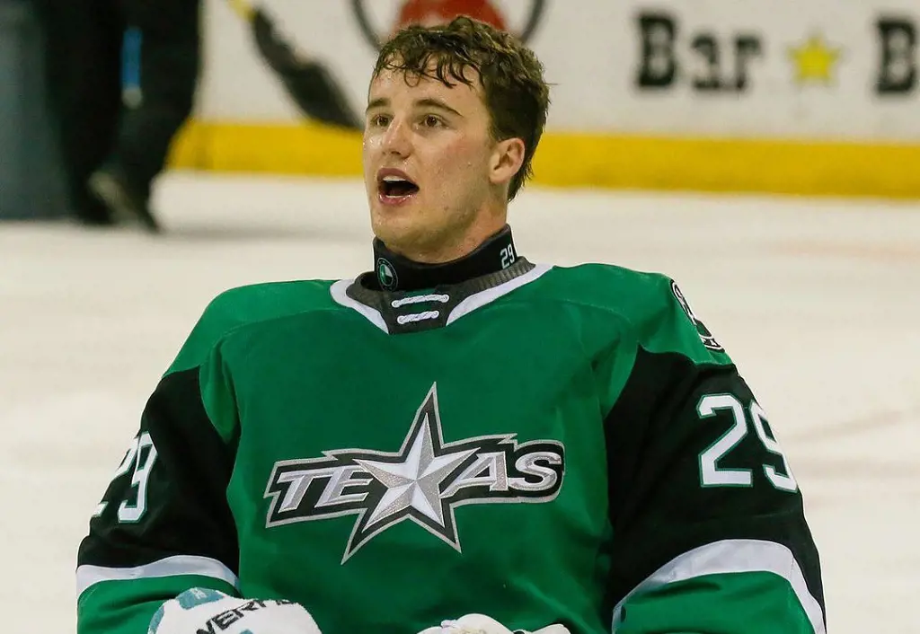 Goaltender of the Stars', Oettinger wearing a full-length round neck protector during a game.