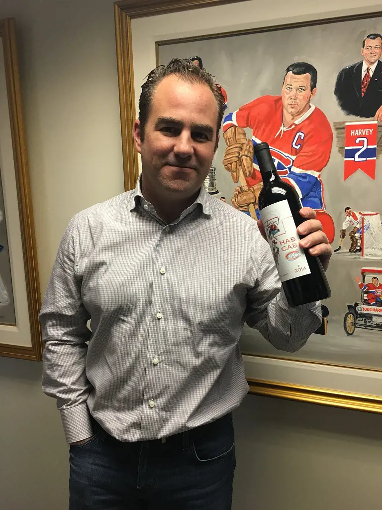 Chairman of the Montreal, Geoff Molson posed holding a exclusive bottle of Hab Cab in March 2018