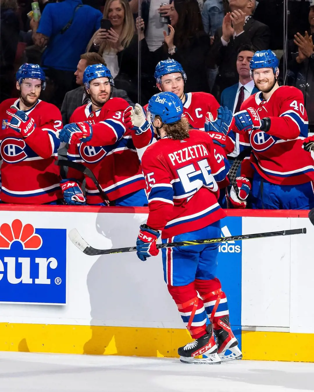 The Montreal players celebrating their first goal in the NHL first shift