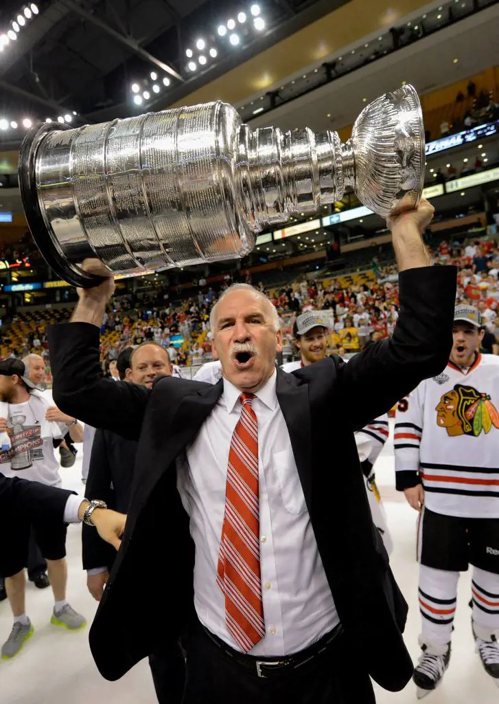Coach Joel Quenneville Lifting The Oldest Playoff Trophy 